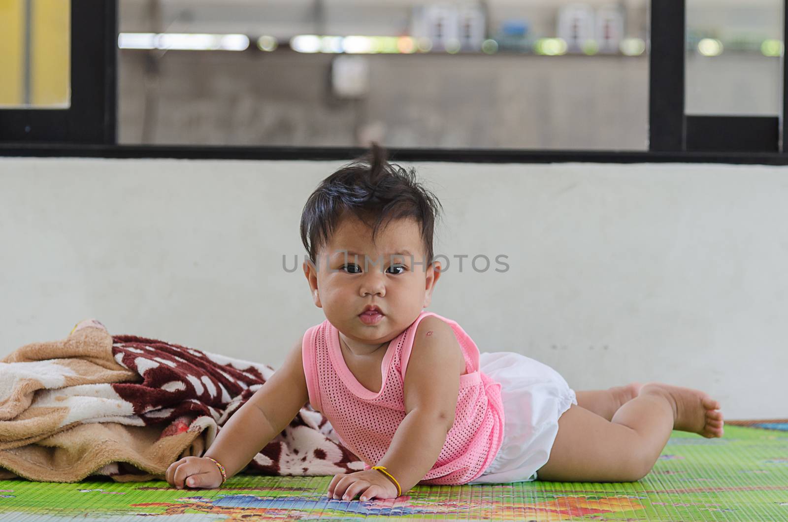 Asian babies crawling on the house floor by aoo3771