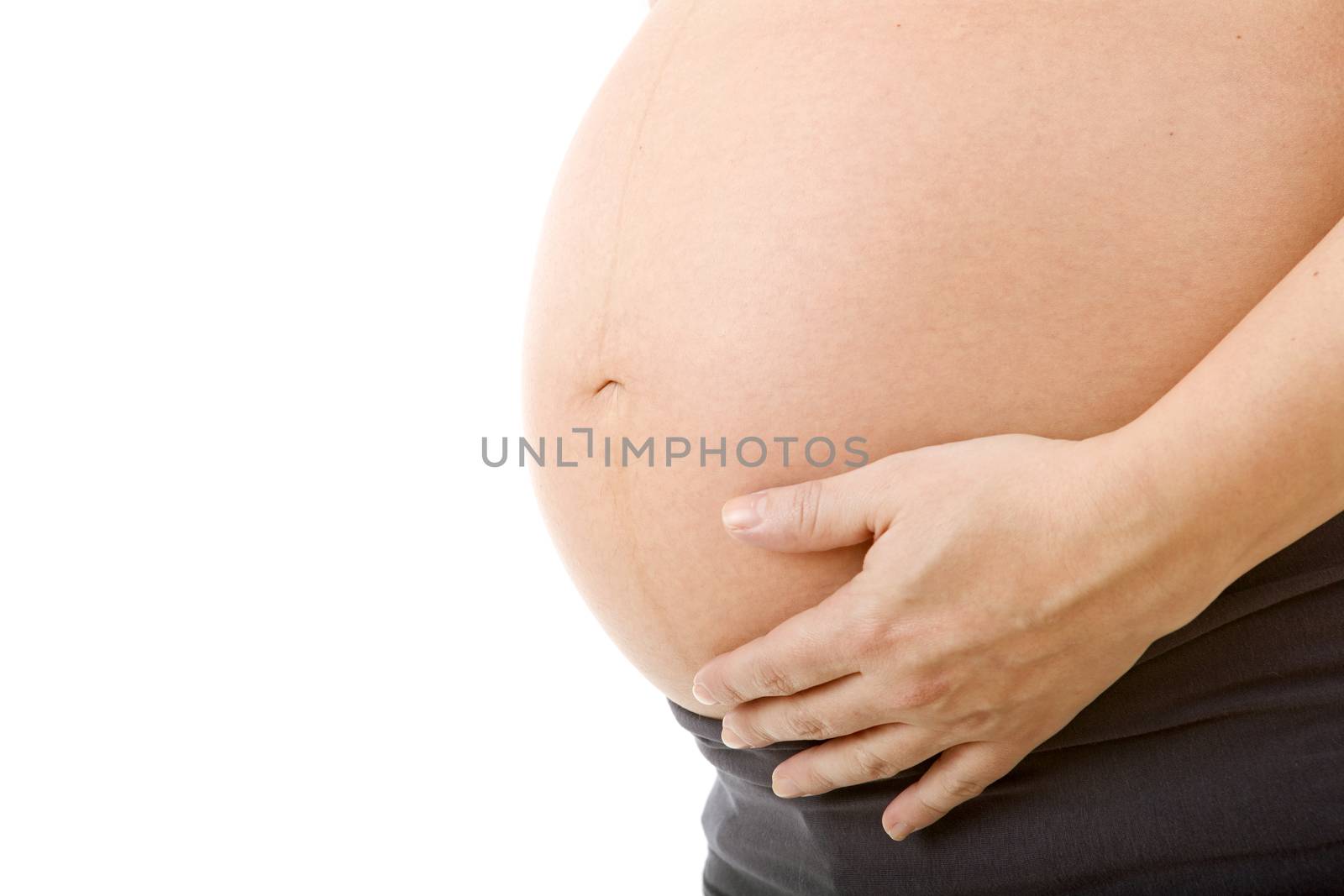 Closeup of pregnant woman at white background