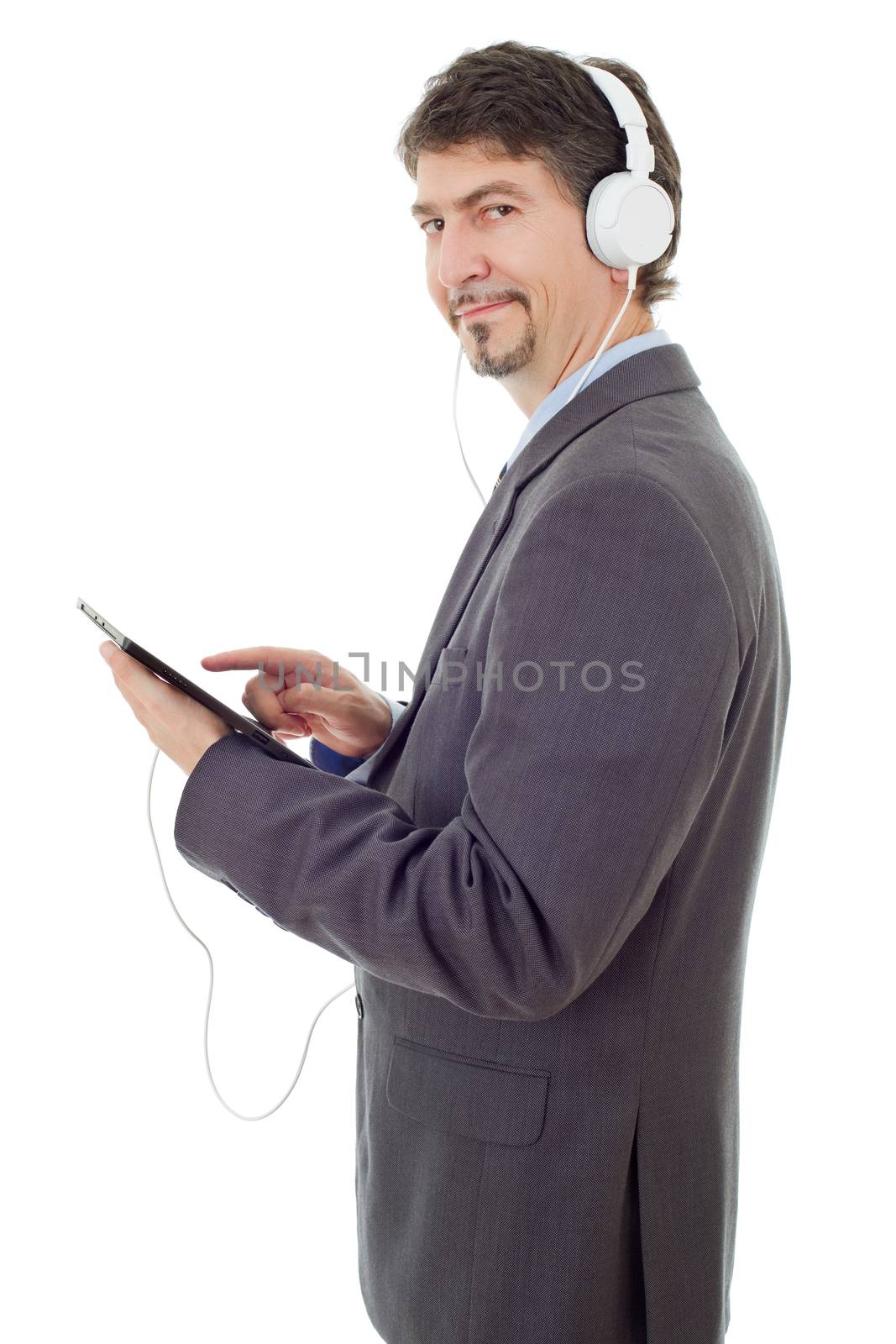 businessman with tablet pc and headphones, isolated