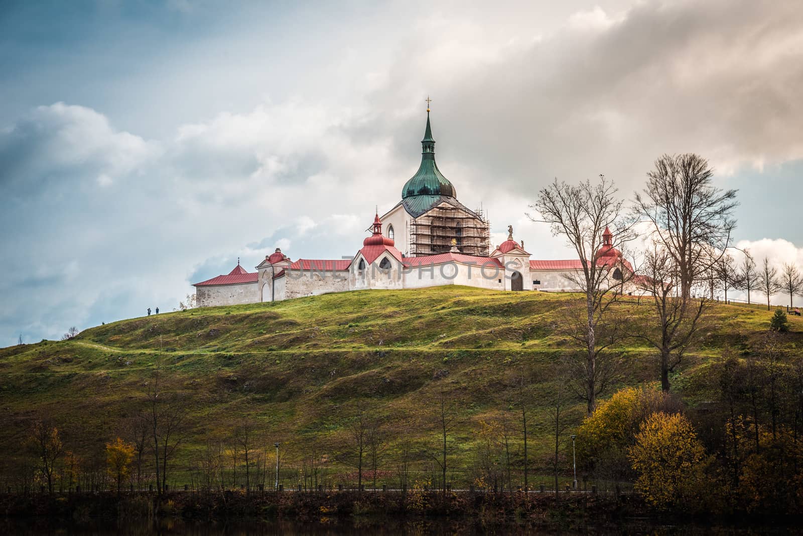 The pilgrimag church on Zelena Hora - Green Hill - Monument UNESCO. St. Jan Nepomucky Church panorama in autumn scene with reflection in the lake water. by petrsvoboda91