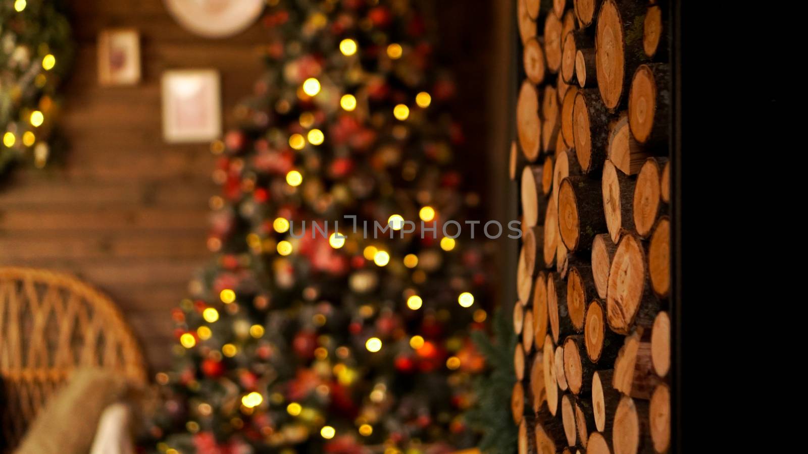 Beautiful holiday decorated room with Christmas tree. Led lighting, cozy home scene. Nobody there.