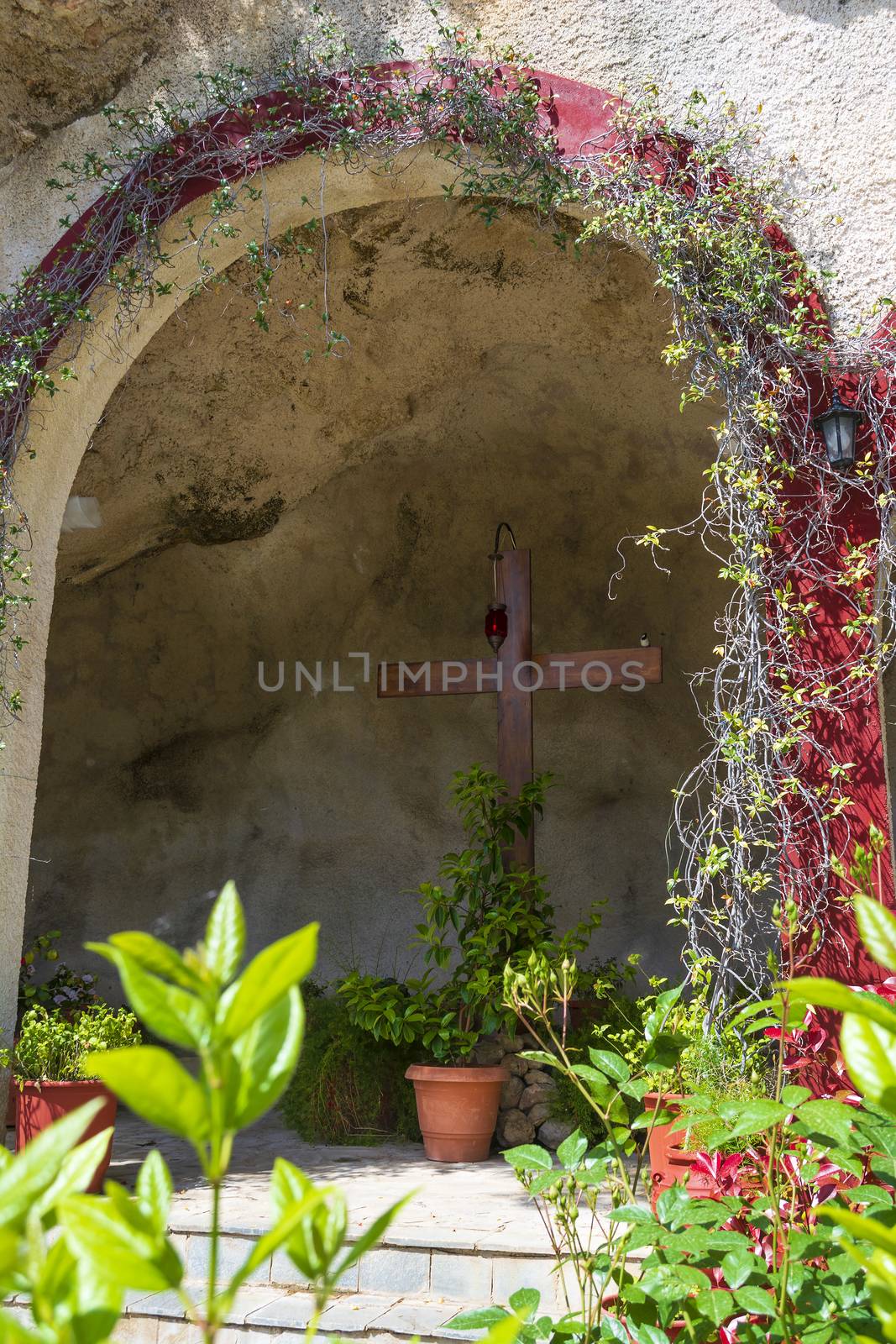 Big wooden cross inside the Orthodox monastery Moni Agiou Ioanni Theologou by ankarb