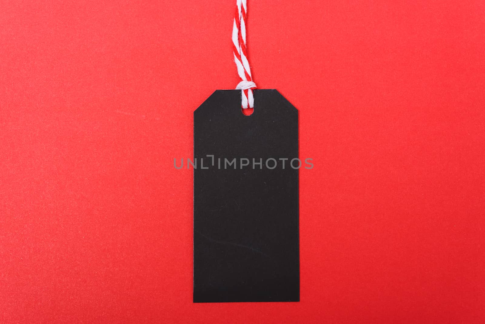 Red tag label on black background, blank copy space for you work, Online marketing shopping concept