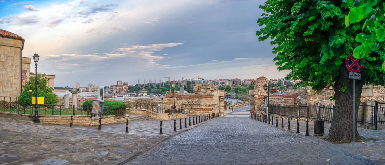 Nessebar, Bulgaria – 07.10.2019.  Ruins of ancient fortifications at the entrance to the Old Town of Nessebar, Bulgaria, on a cloudy summer morning