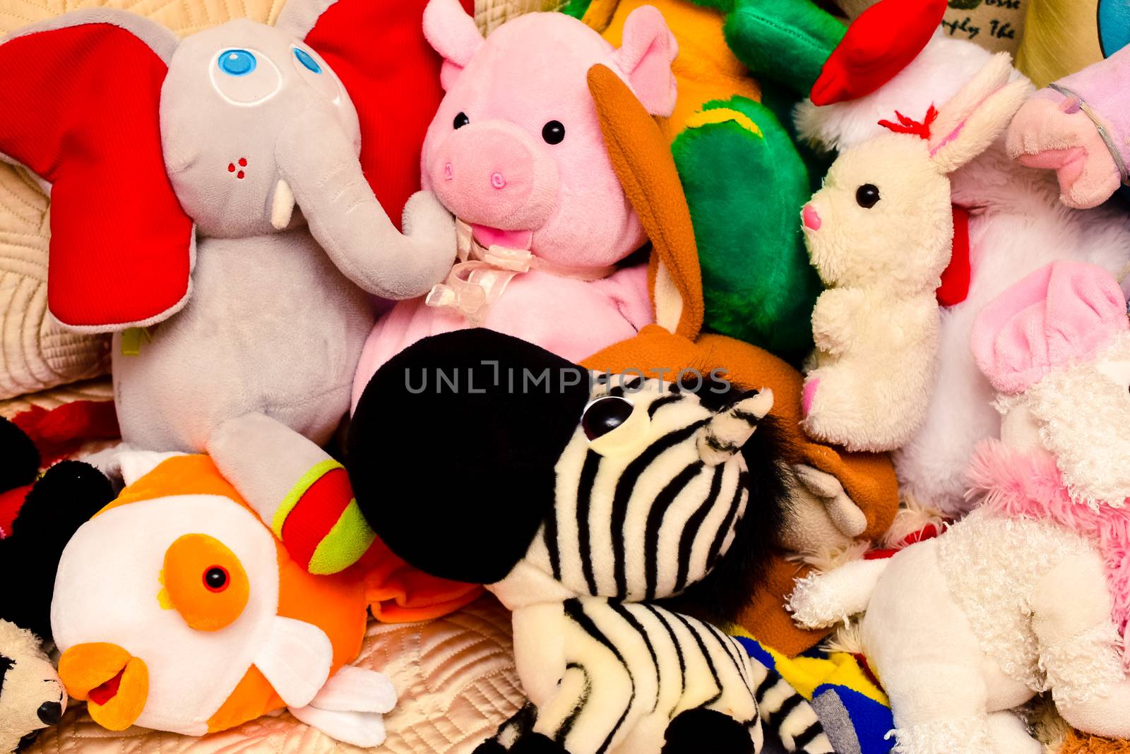 bright colored soft toys in a messy situation by alexandr_sorokin