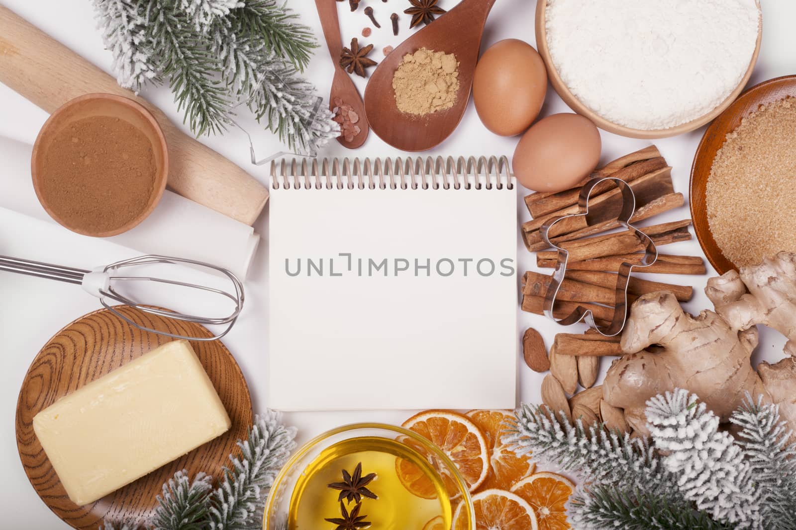 Christmas gingerbread cookies cooking background flat lay top view template with copy space for text. Baking utensils, spices and food ingredients