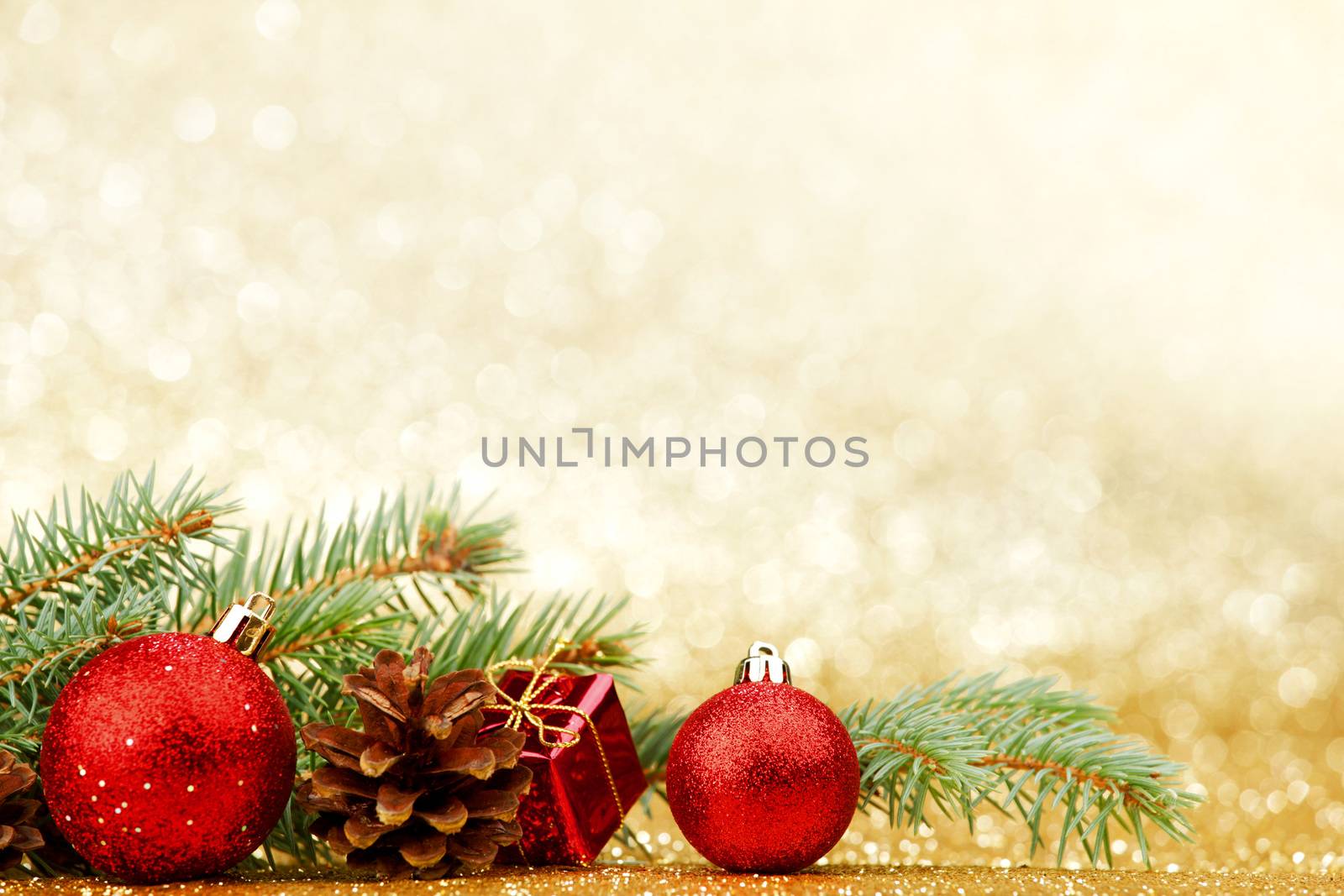 Christmas card with fir and decor on glitter background