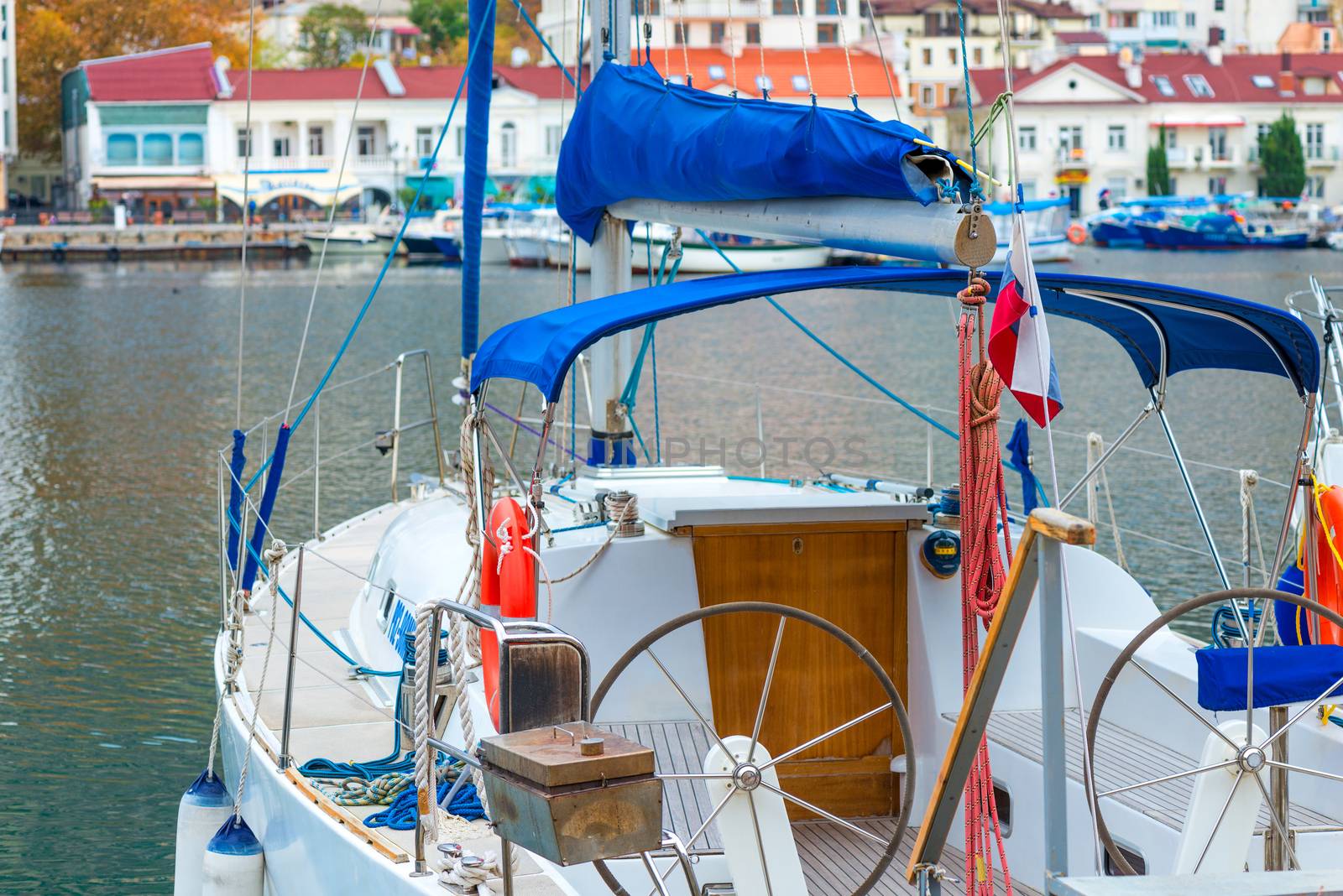 Yacht close-up at the port on the sea by kosmsos111