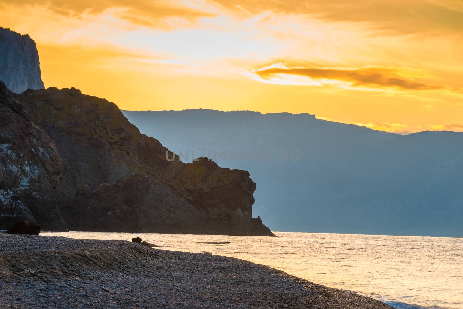 rocky shore, beautiful dawn on the sea in the early morning, beautiful scenery