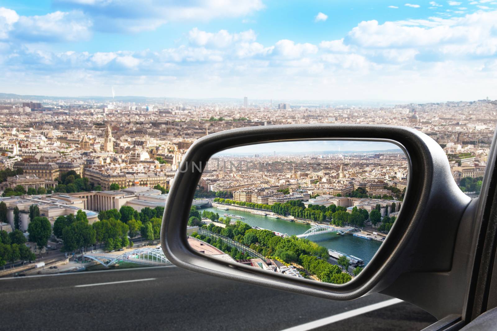 Paris view through a rearview mirror