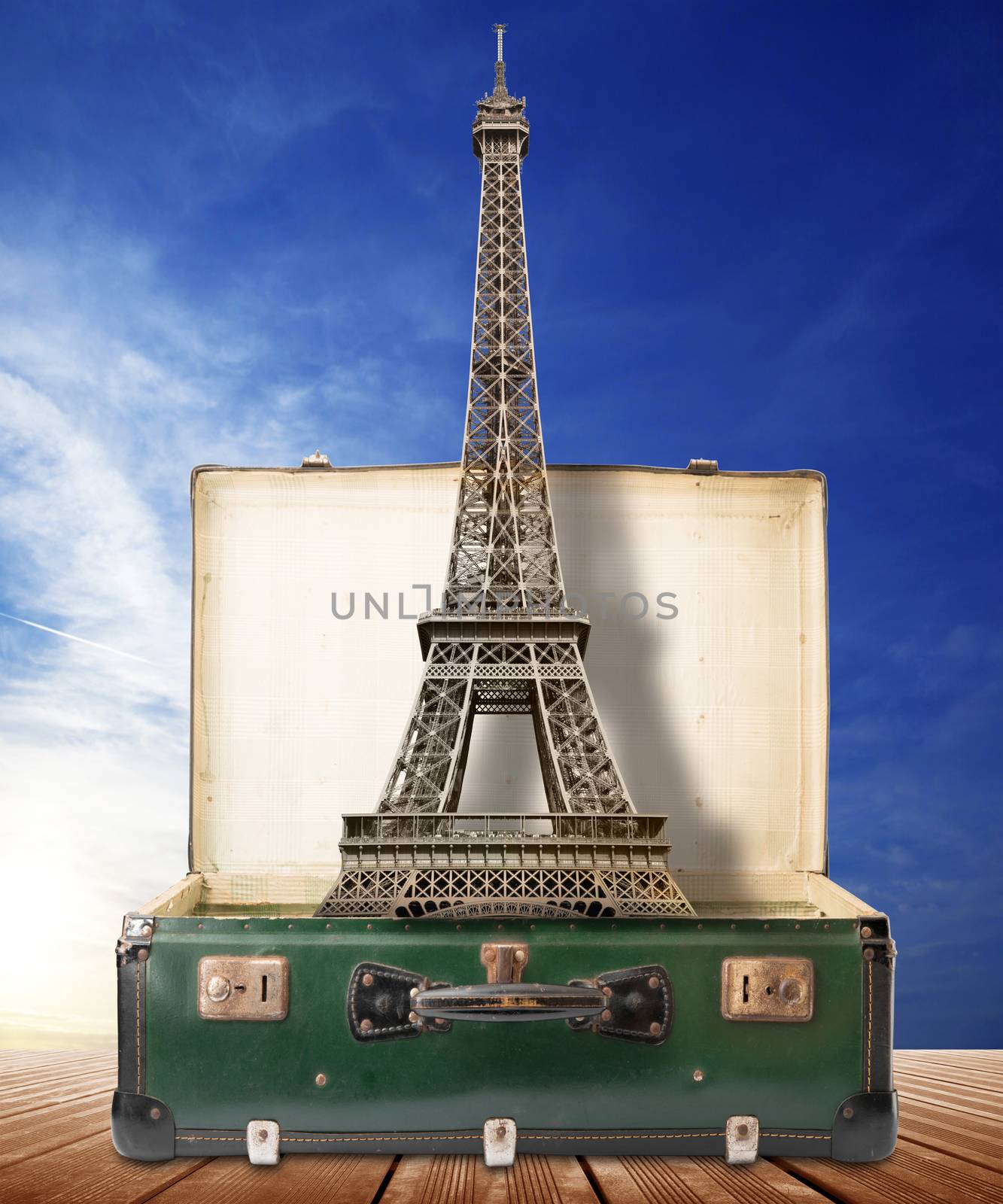 the Eiffel Tower in a suitcase