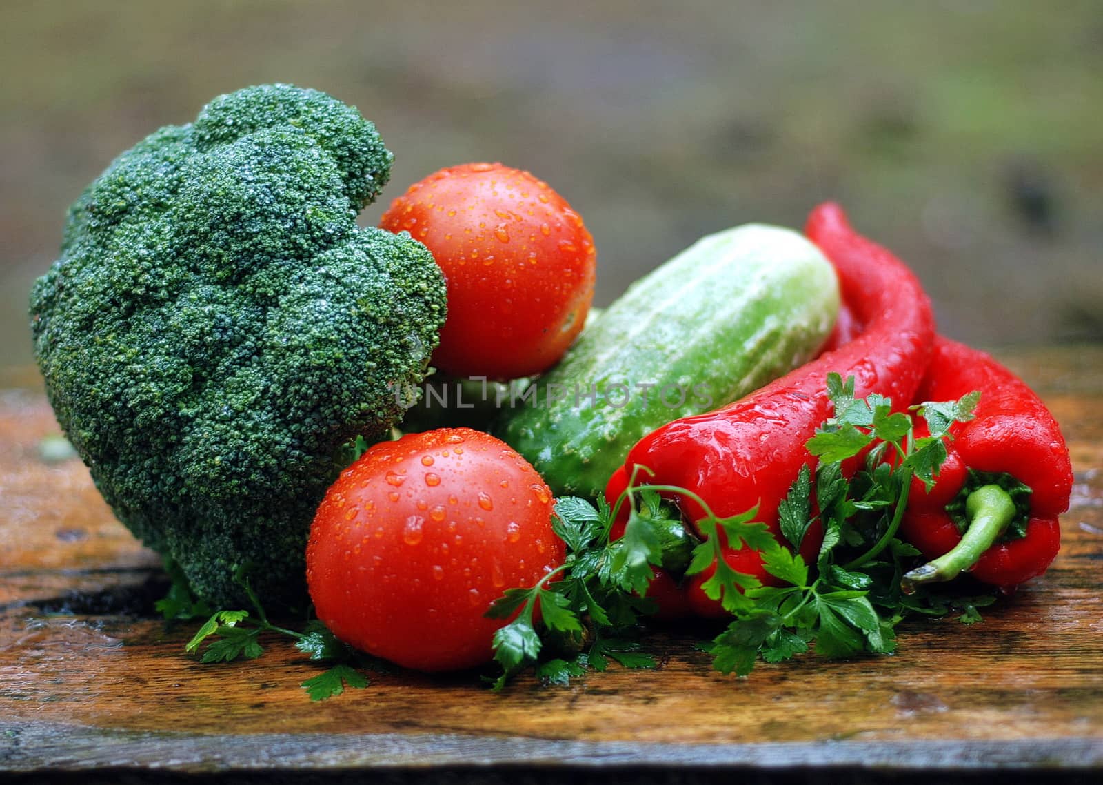 In images Fresh organic vegetables. Food background. Healthy food from garden