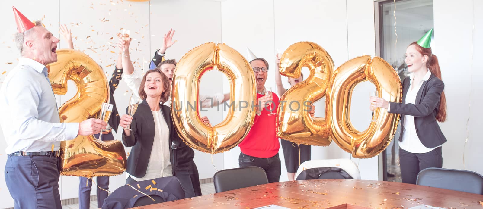 People Celebrating New Year in Office by ALotOfPeople