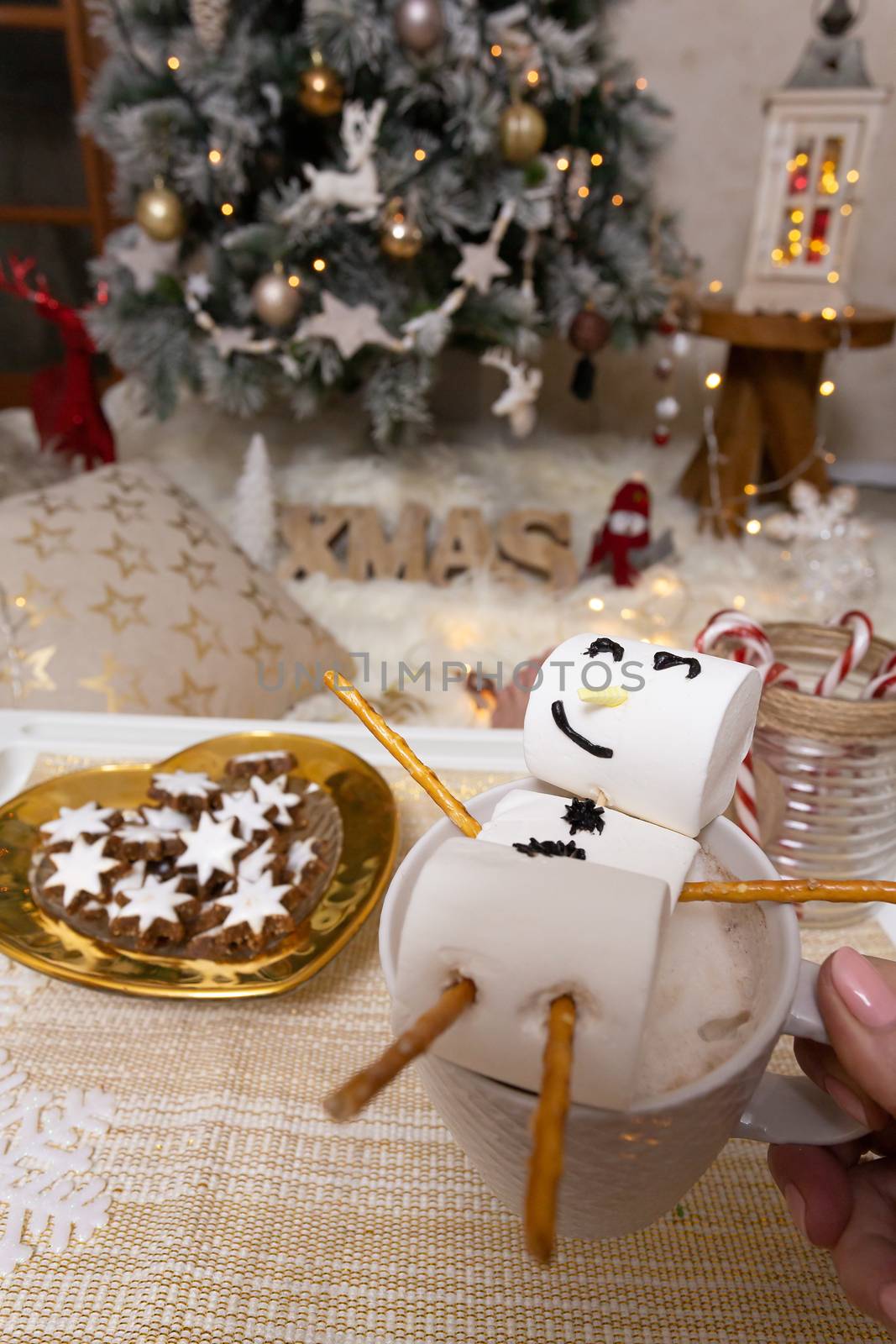 Marshmallow snowman float in hot chocolate at Christmas by lovleah