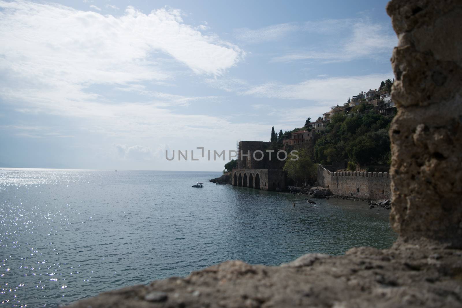 Landscape of ancient shipyard near of Kizil Kule tower - Alanya peninsula, Turkey