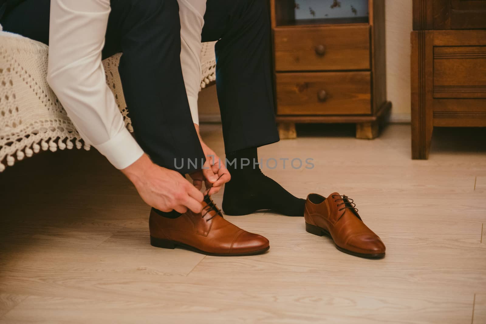 Groom black elegant shoes. Wedding detail. Close up