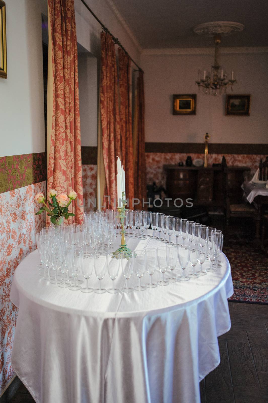 Beautifully decorated wedding table and other details at wedding hall. Wedding day