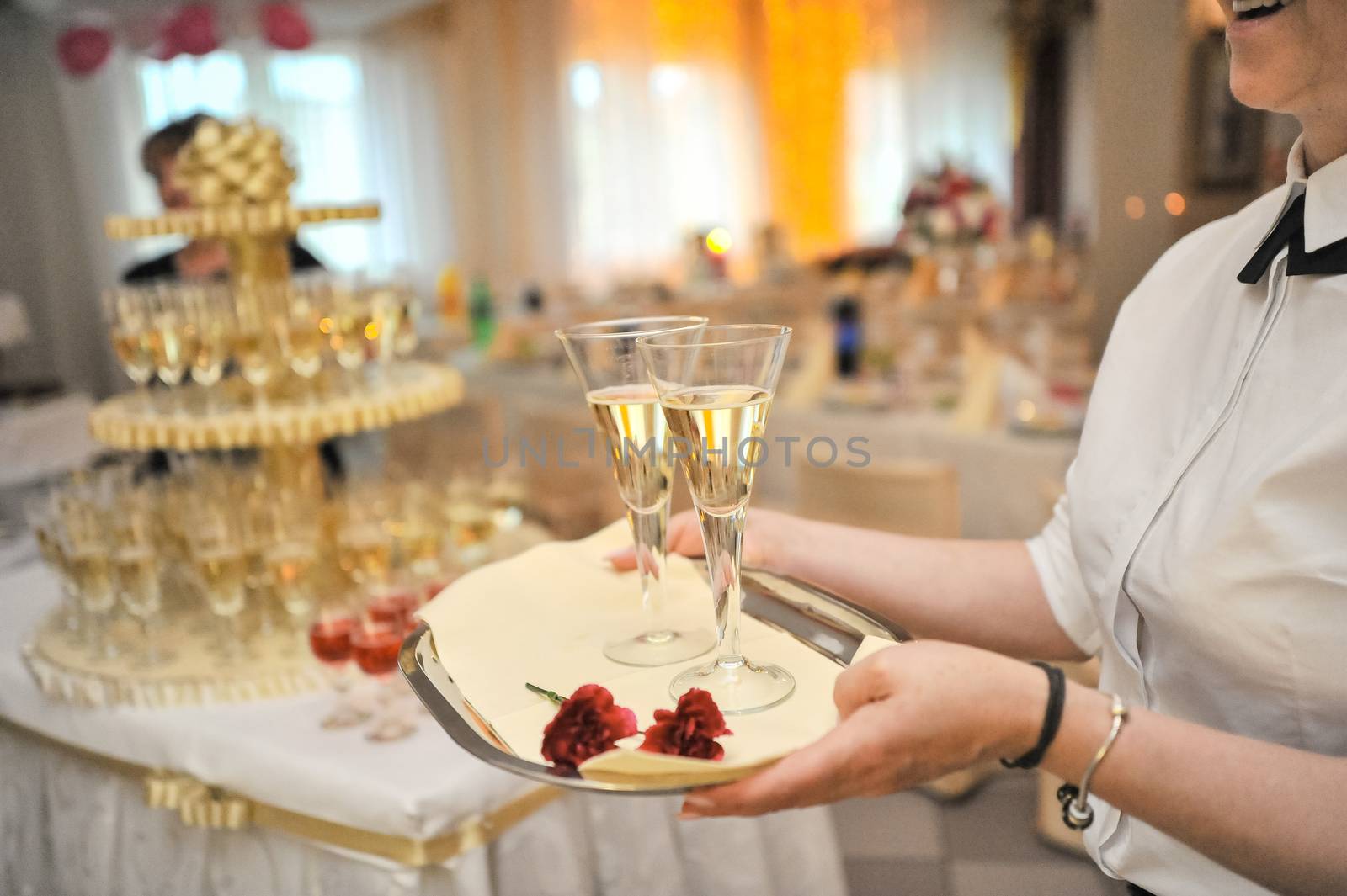 first toast of the bride and groom with a glass of champagne
