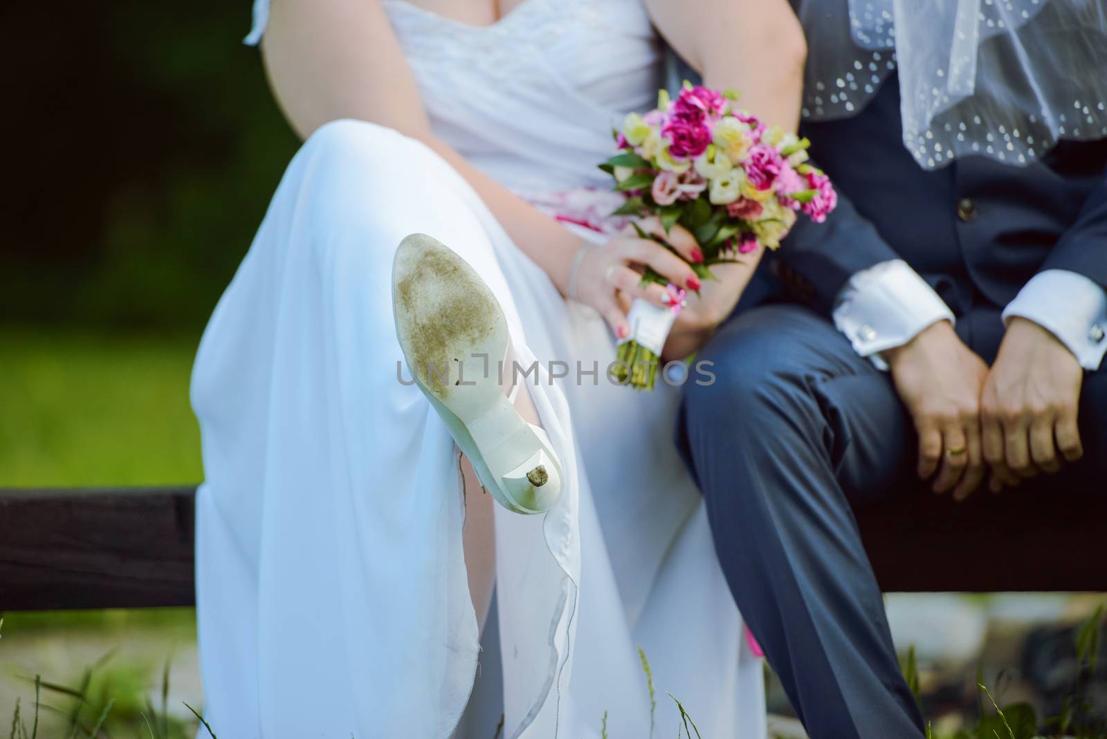 Bride and groom at a photo session in the nature.