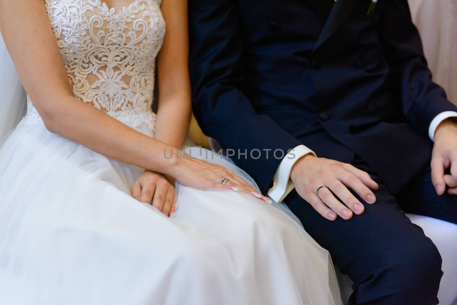 Bride and groom at church wedding during ceremony. Beautiful decoration