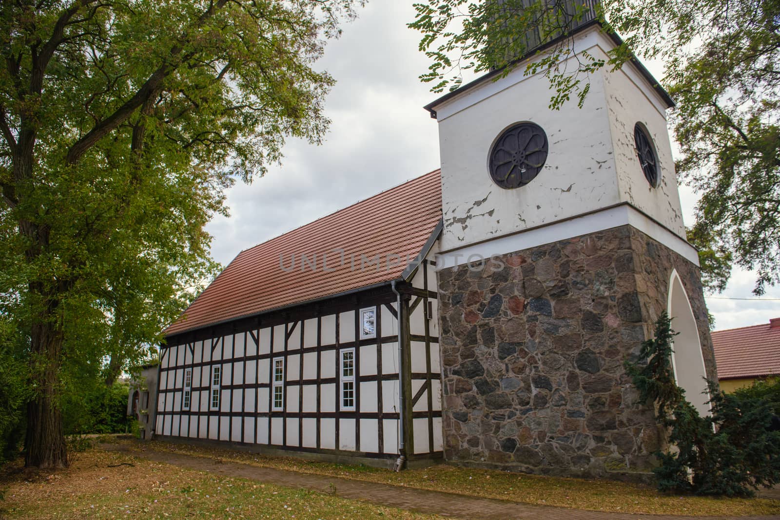 Church exterior during wedding ceremony. Blue sky with sunny weather