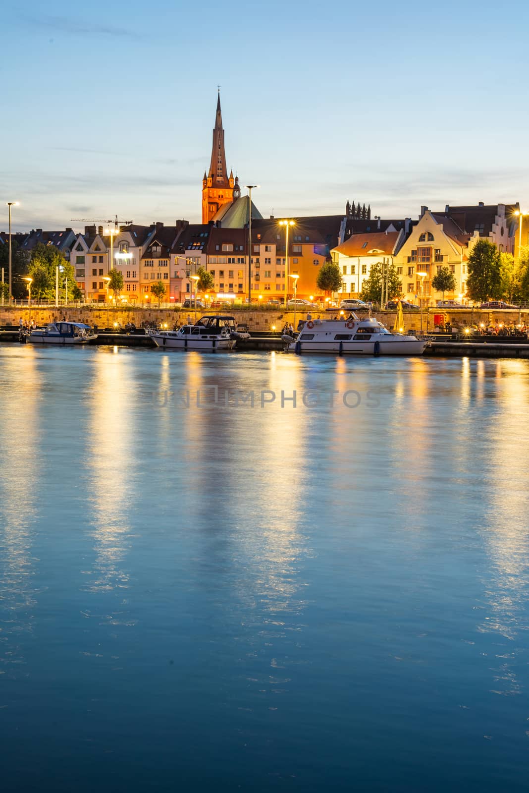 Cityscape with Odra river. Szczecin historical city with architectural layout similar to Paris. Castle of Pomeranian dukes in Szczecin and Basilica of Saint James