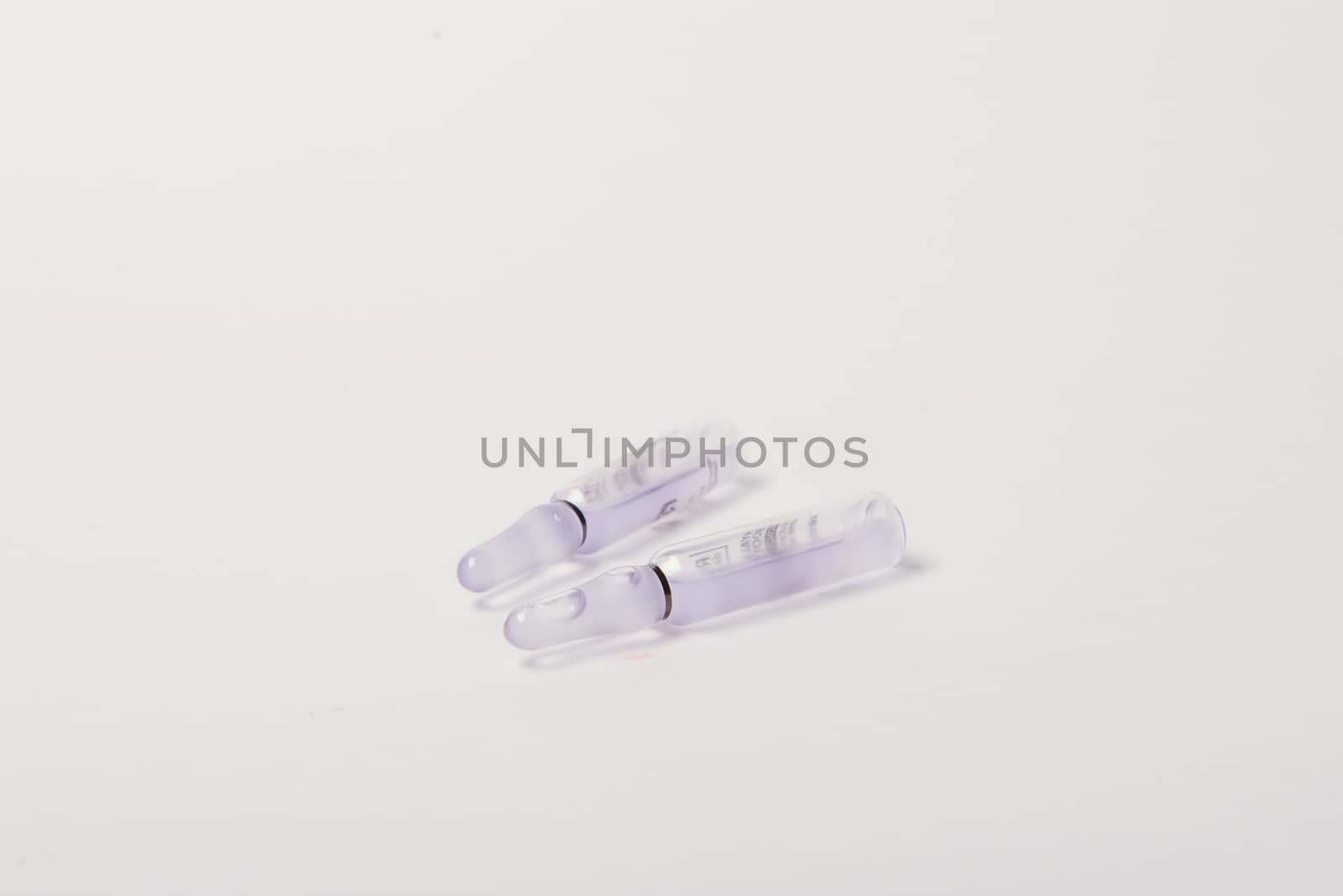 Medical ampules for injections on a white background