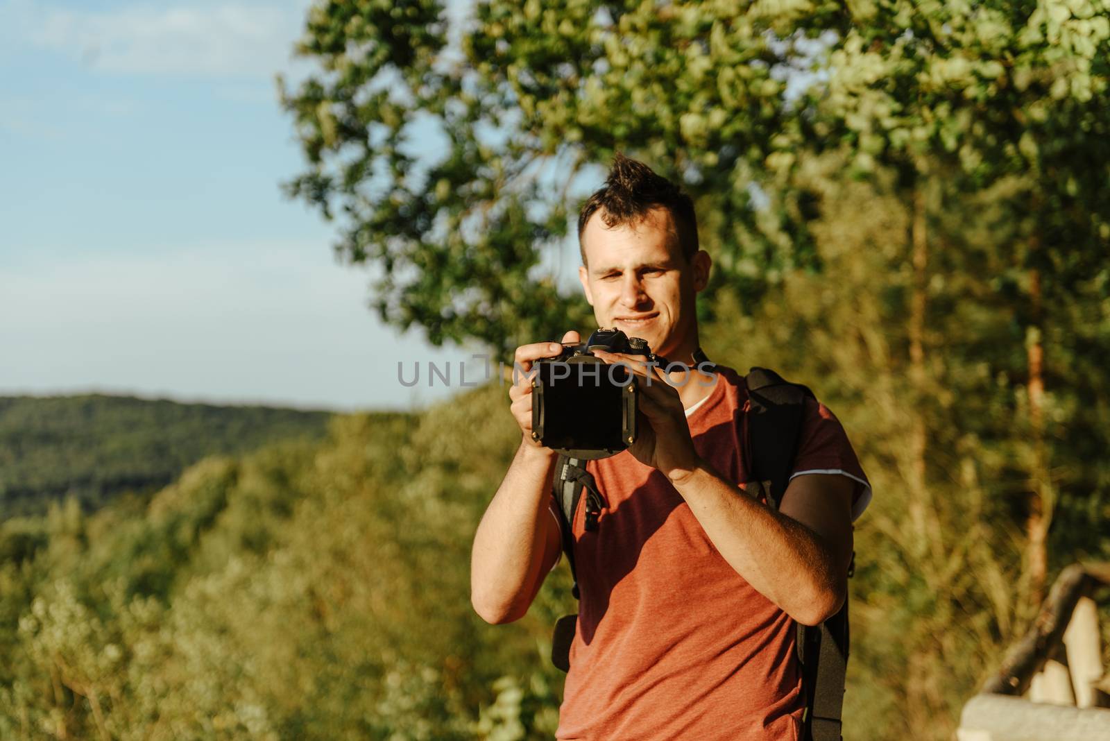 Photographer's boyfriend takes a photo. Summer season. Nature and landscape photography
