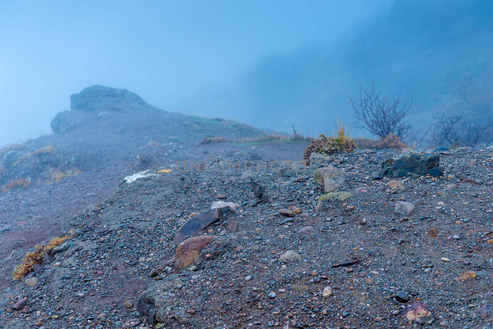 closeup of stones, road in the mountains in thick autumn fog, gl by kosmsos111