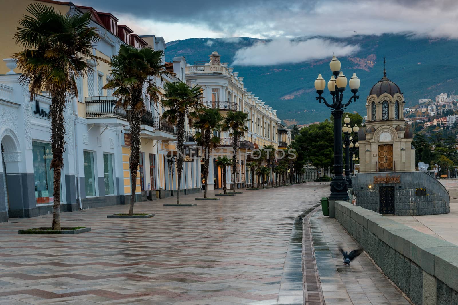 Embankment of the Russian city of Yalta in the autumn afternoon, by kosmsos111