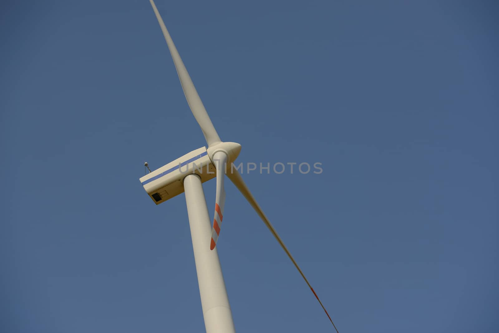 wind trubine at sunny day with blue sky