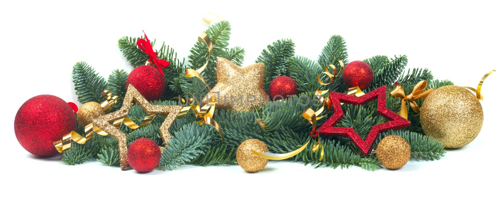 Christmas Border design element of fir tree branches and red and golden baubles and stars isolated on white background