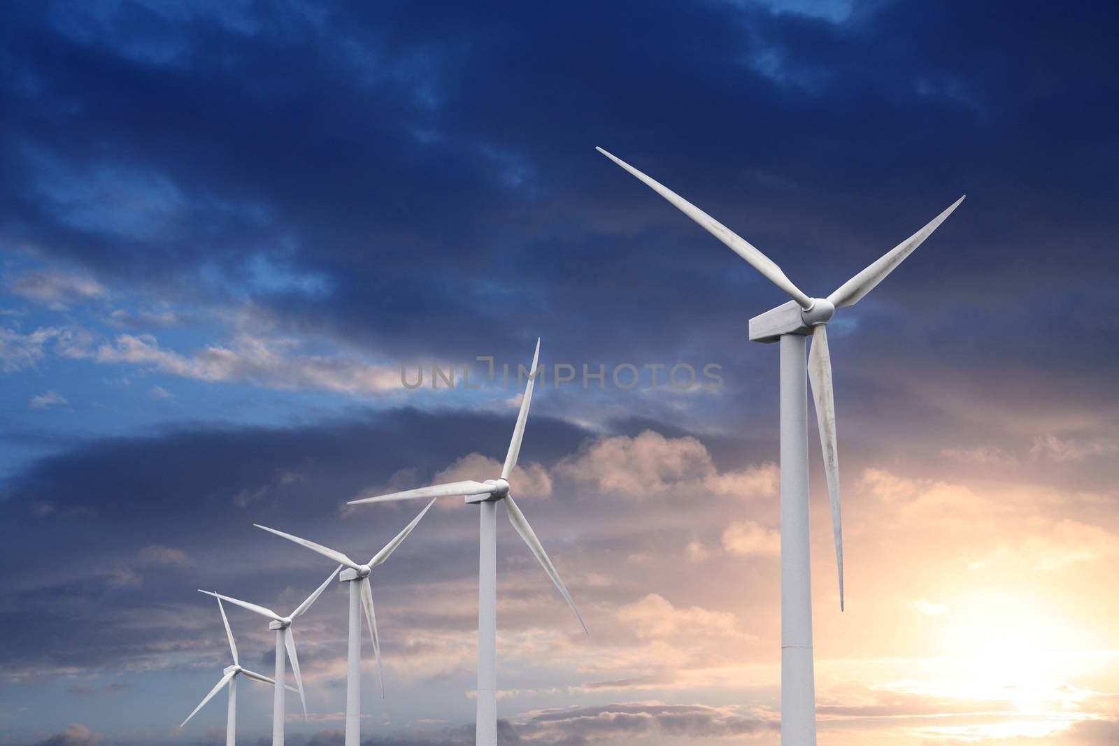 wind turbine on sunset background