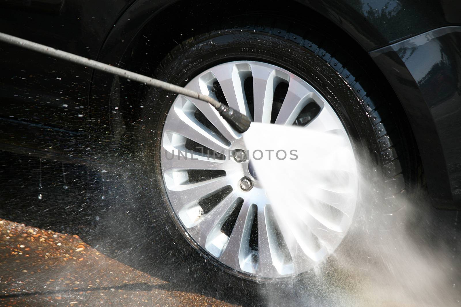 car wash in action at station service