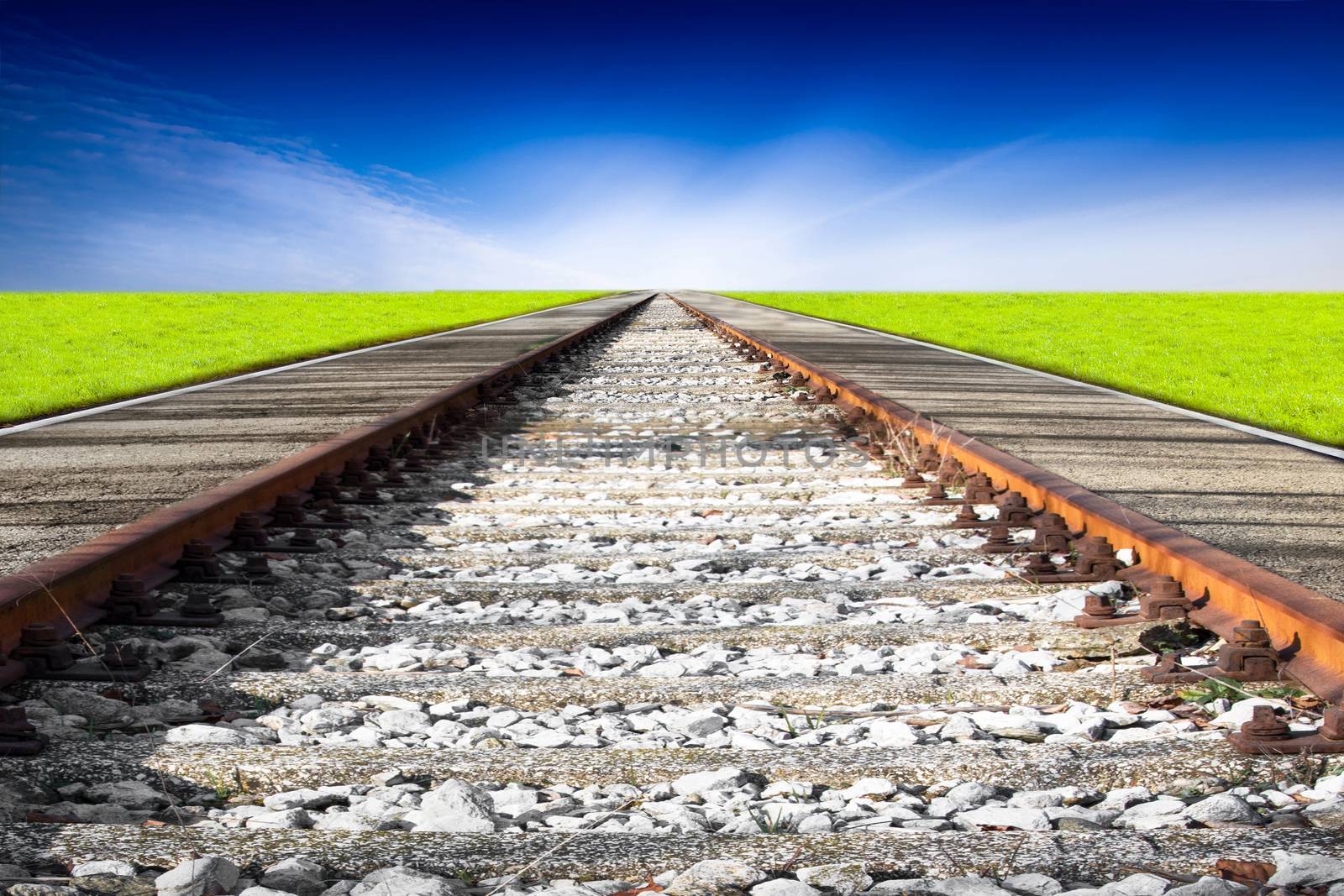 Train rails in country landscape