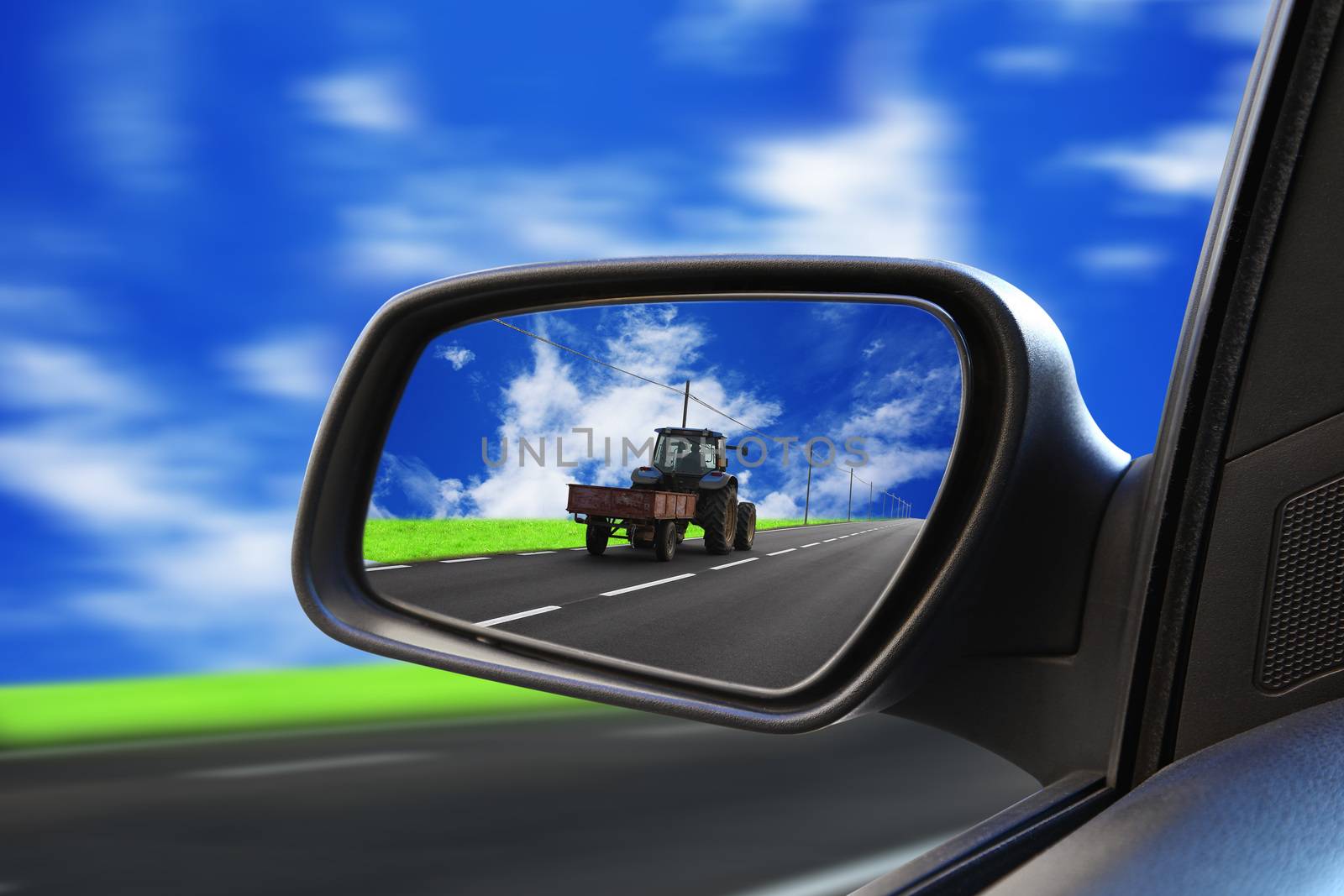 road in rearview mirror by photobeps