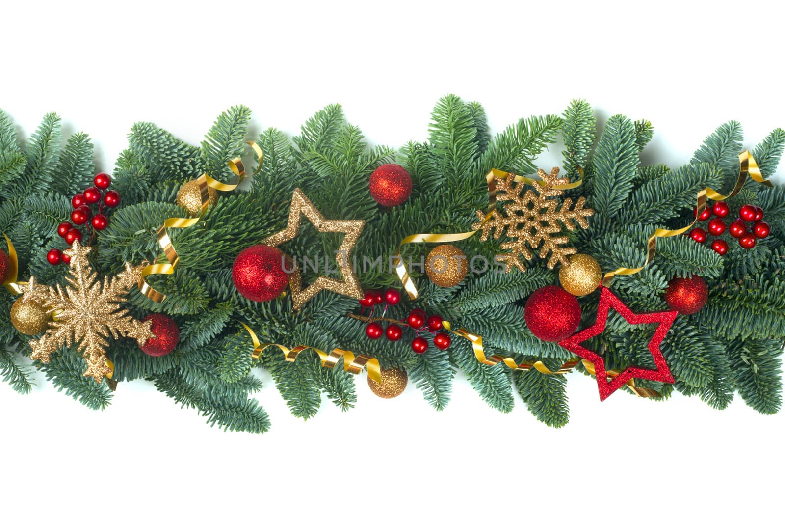 Christmas Border frame of natural noble fir tree branches red and golden baubles isolated on white background