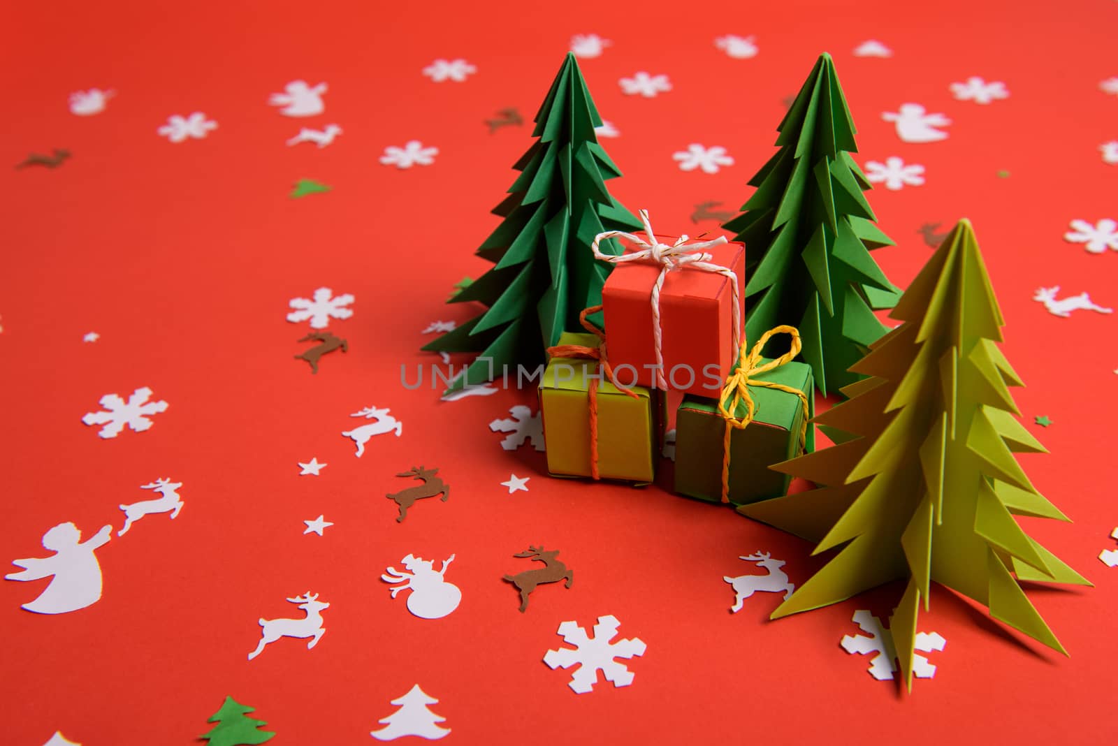Christmas or New Year background, plain composition made of Xmas decorations and fir branches, flat lay, blank space for a greeting text.