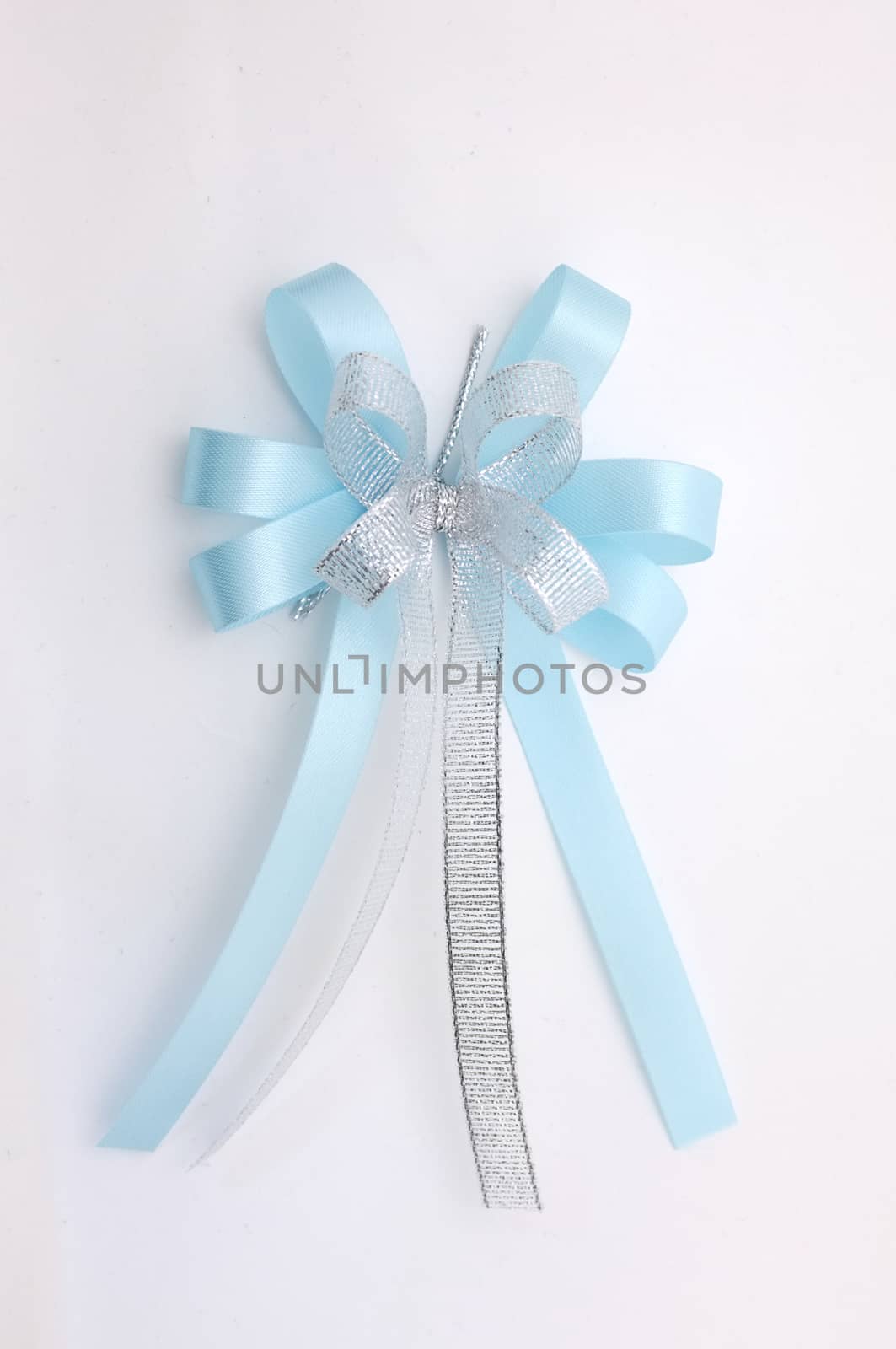 Blue lush bow isolated over white background