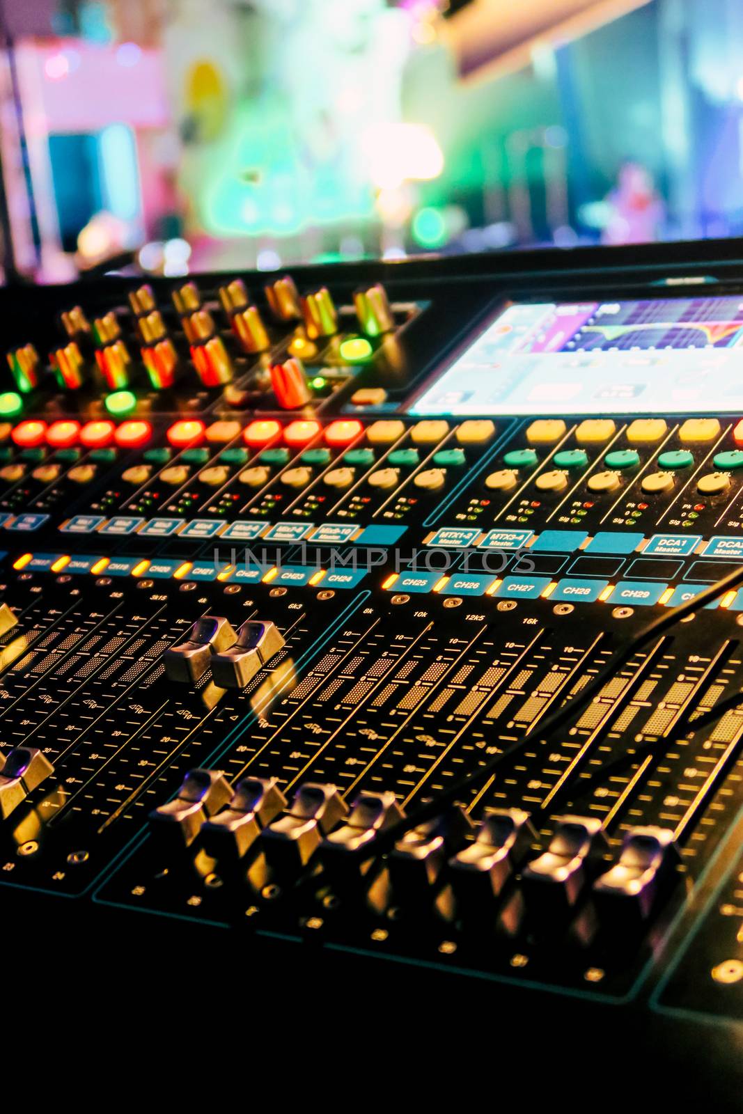 Closeup of an audio mixing control panel