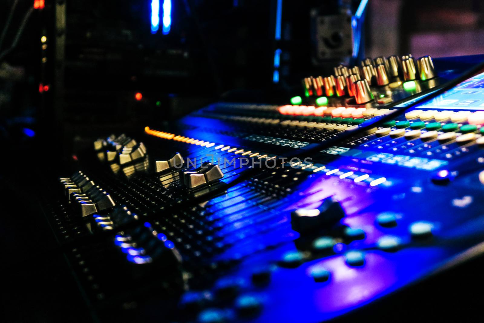 Closeup of an audio mixing control panel
