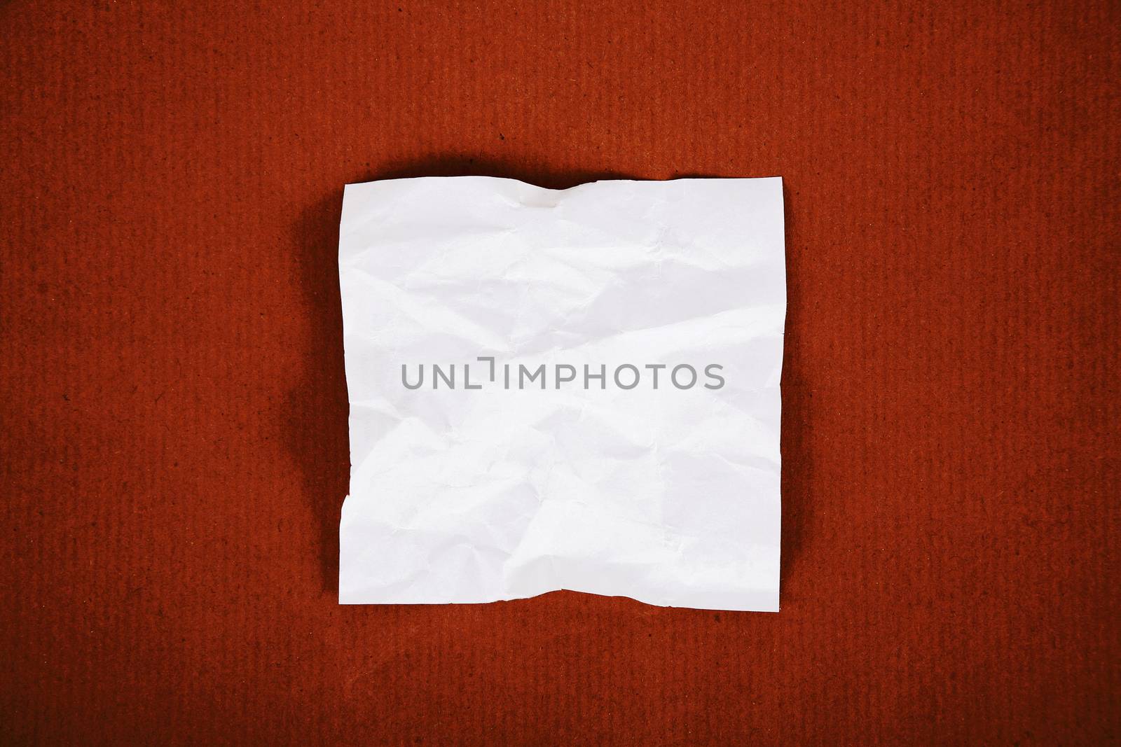 White sheet on cardboard background