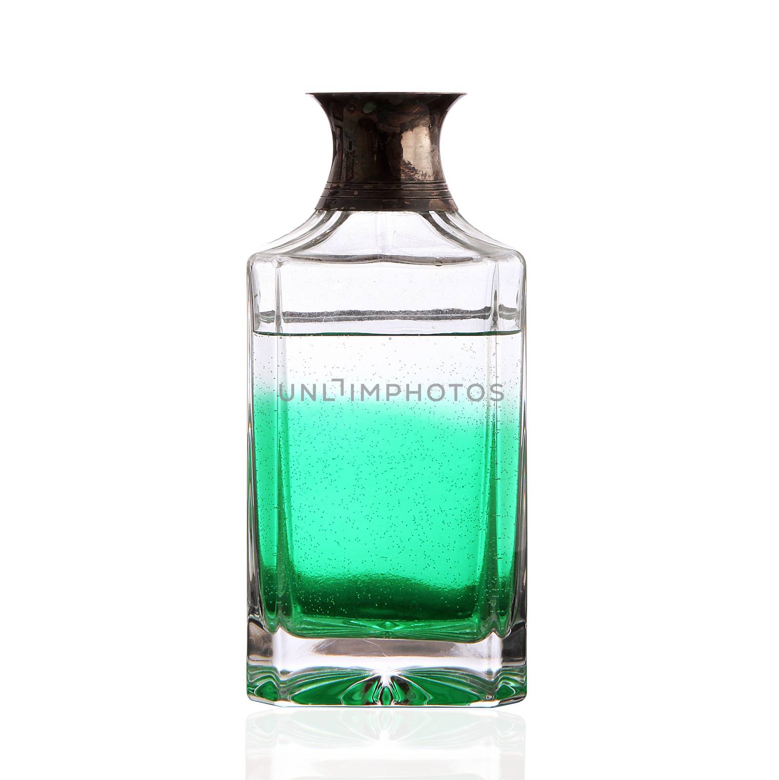 bottle with green liquid on white background