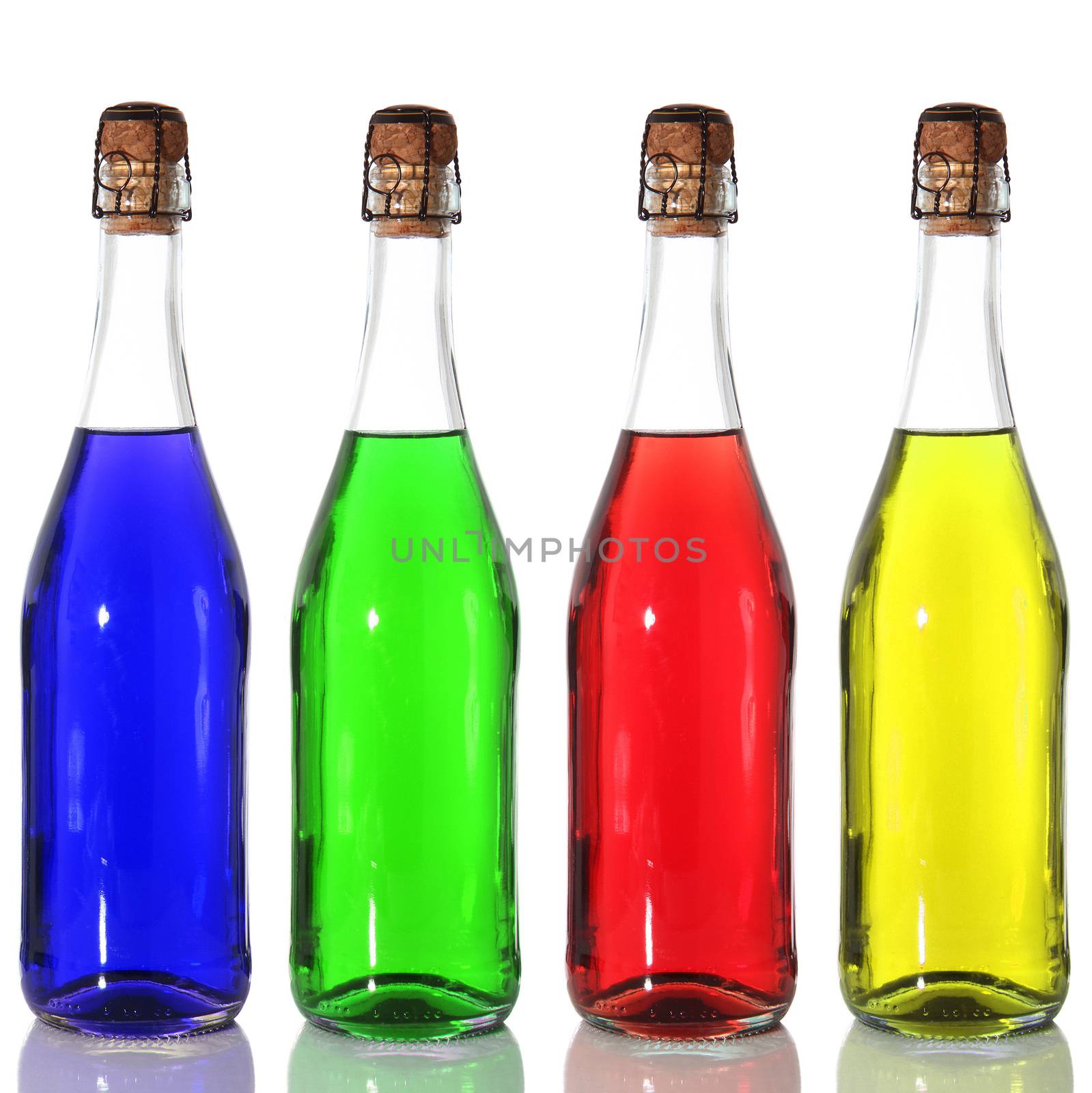 colored bottles on white background