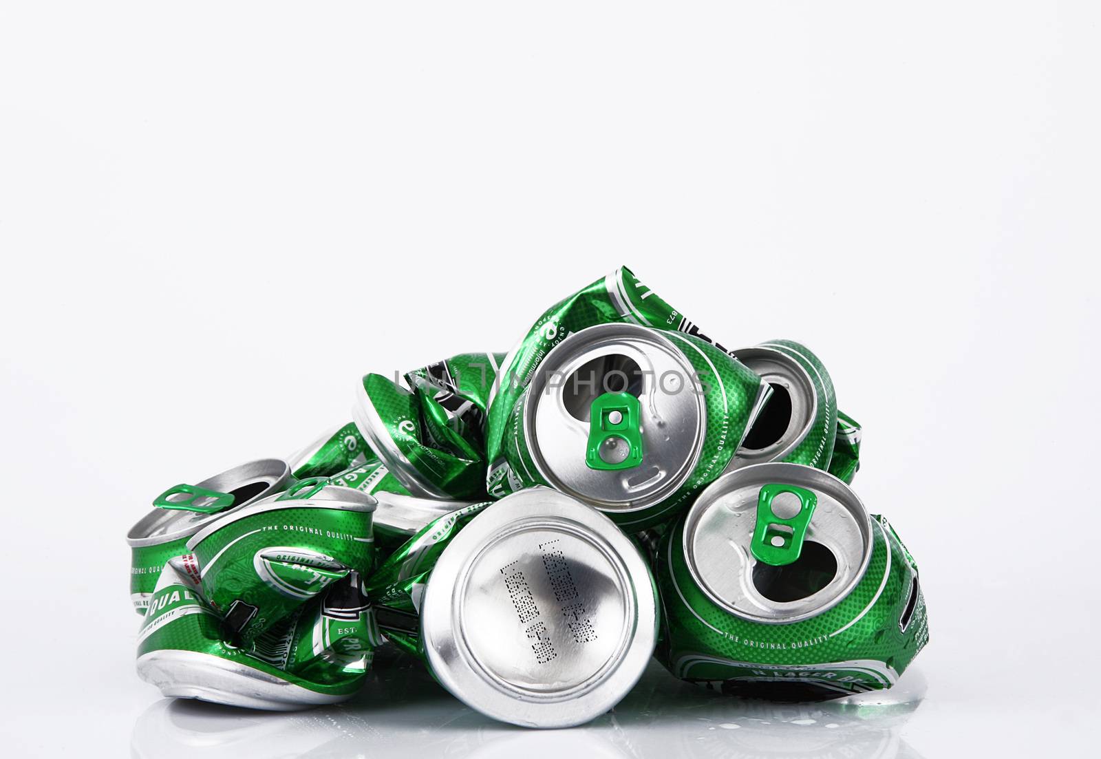 Crushed aluminum can on white background