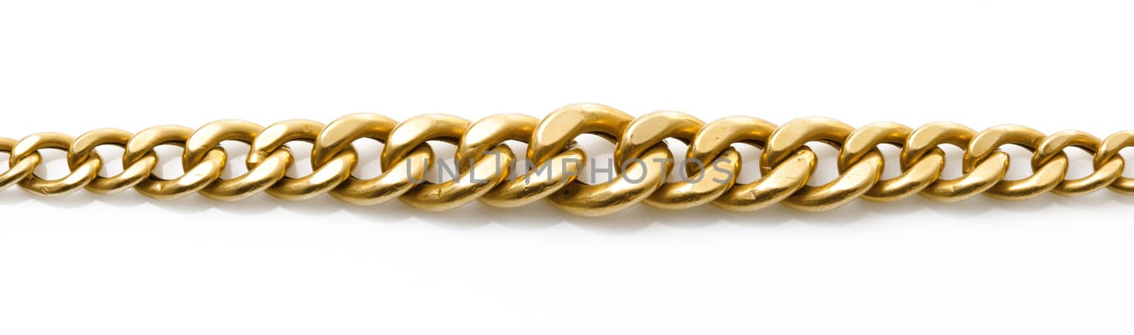 precious gold chain on white background