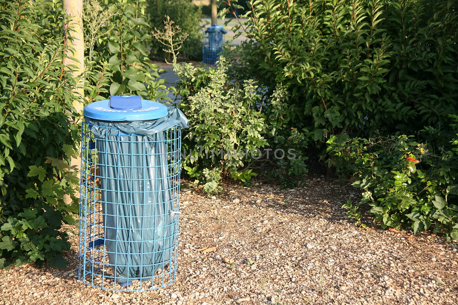 a trash can in the park