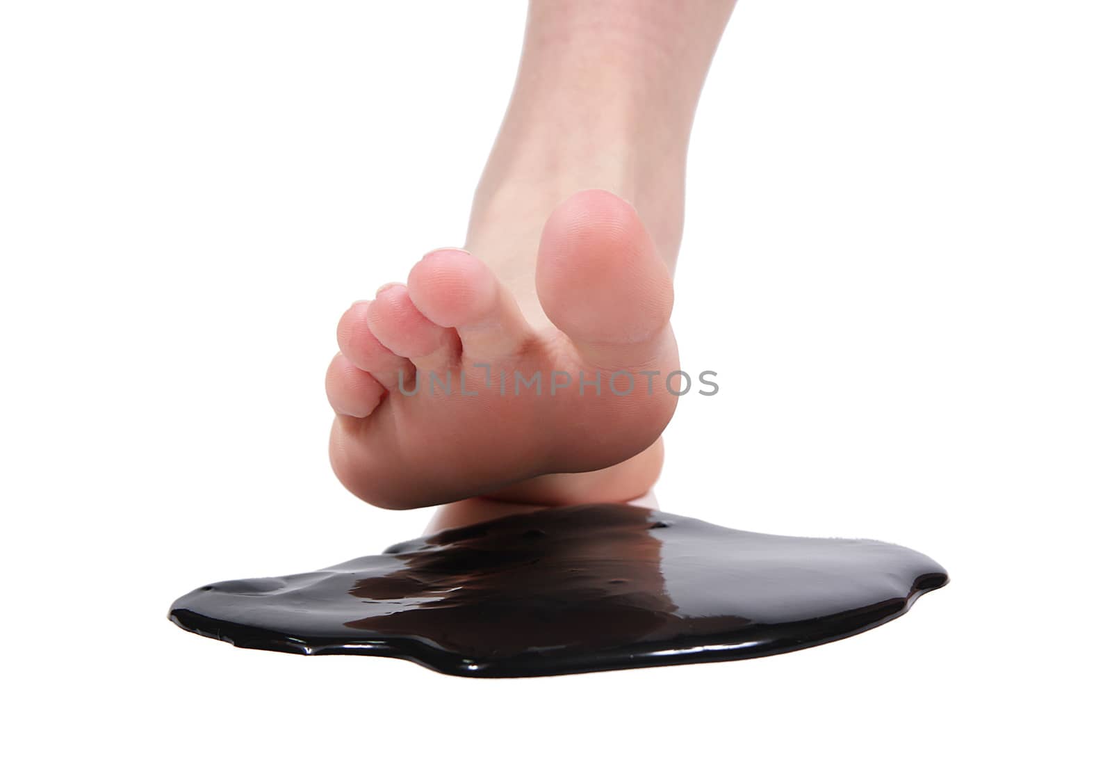 Foot crushing stain of tar on white background