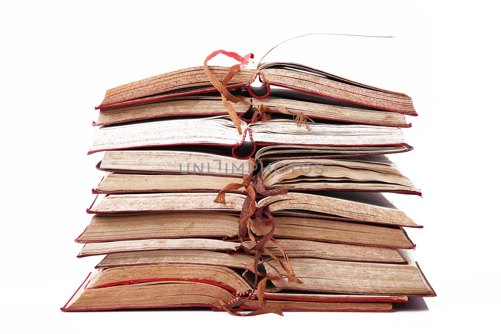 Stack of  books in white background by photobeps