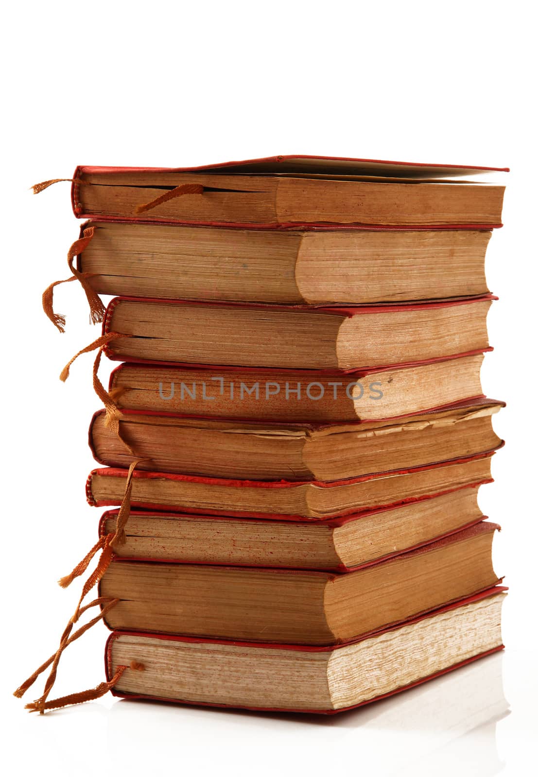 Stack of books on white background